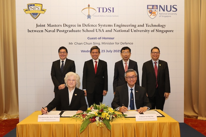 National University of Singapore (NUS) President professor Tan Eng Chye and Naval Postgraduate School (NPS) President retired U.S. Navy Vice Adm. Ann E. Rondeau, Ed.D. signed the new partnership agreement during a ceremony held at NUS in Singapore, July 23.