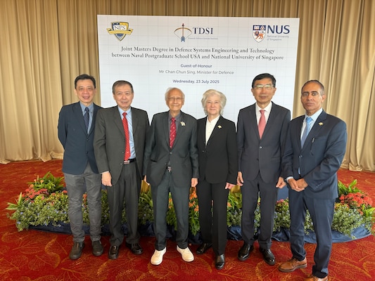 Leaders from Singapore and the U.S. pose for a picture at the signing ceremony, July 23.