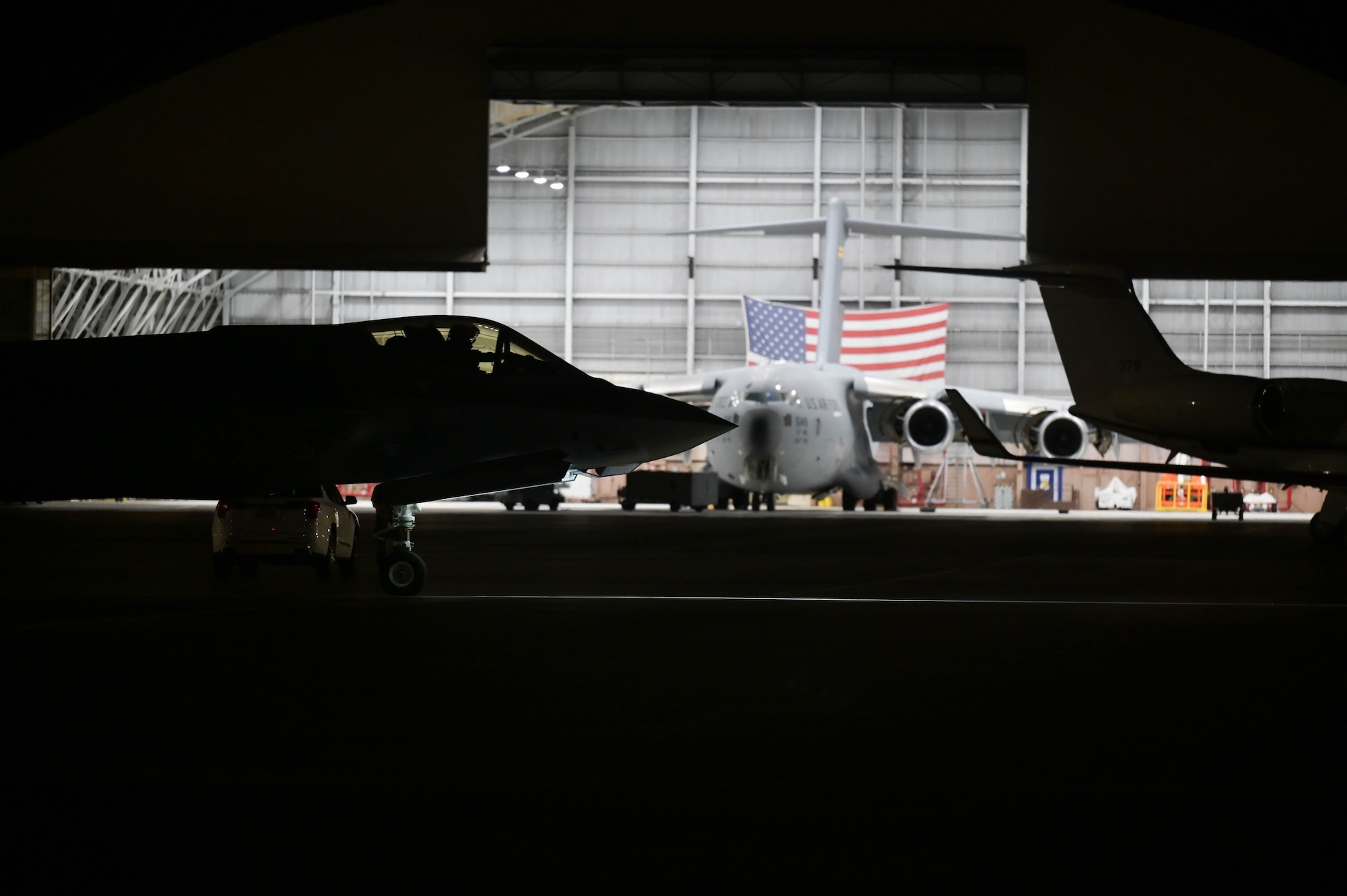 Aircraft taxiing on a flight line.