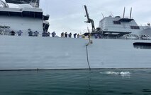 Explosive Ordnance Disposal Technician 1st Class Shane Norby conducts fast rope training aboard Uraga-class minesweeper JS Bungo (MST 464) during Mine Warfare Exercise (MINEX) 2JA near Ominato, Japan, July 15, 2025.
