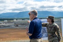 Secretary of the Air Force Troy Meink and U.S. Air Force Col. Lisa Mabbutt, Joint Base Elmendorf-Richardson and 673rd Air Base Wing commander, discuss plans for future construction projects.