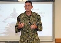 JOINT BASE SAN ANTONIO-FORT SAM HOUSTON – (July 31, 2025) – Cmdr. Nicholas Hamlin, Dental Corps, executive officer, Naval Medical Research Unit (NAMRU) San Antonio, delivers remarks during the annual Naval Research Enterprise Research Intern Program Presentations held at the Battlefield Health and Trauma Research Institute. Eight student interns enrolled in the Office of Naval Research’s Naval Research Enterprise Internship Program (NREIP) and Oak Ridge Institute for Science and Education (ORISE) presented their research to mentors, scientists and staff. NREIP places college and university students in the Department of the Navy laboratories where they take part in real Naval research for ten weeks during the summer. NREIP gives academically talented college students, graduating seniors, and graduate students pursuing STEM careers the opportunity to learn about Naval research and technology while receiving first-class mentoring by top scientists and engineers. ORISE is a U.S. Department of Energy asset that is dedicated to enabling critical scientific, research, and health initiatives of the department and its laboratory system by providing world class expertise in STEM workforce development, scientific and technical reviews, and the evaluation of radiation exposure and environmental contamination. Navy Medicine Research & Development (NMR&D) makes use of multiple channels to recruit and retain critical U.S. Navy medical support personnel. The research commands reach out to the next generation of scientists through conferences, STEM events, internships and career days, and support recruiting efforts early in undergraduate and graduate programs. NAMRU San Antonio, part of NMR&D, conducts gap-driven combat casualty care, craniofacial, and directed energy research in support of Navy, Marine Corps and joint U.S. warfighter health readiness and lethality while engaged in routine and expeditionary operations. (U.S. Navy photo by Burrell Parmer, NAMRU San Antonio Publ