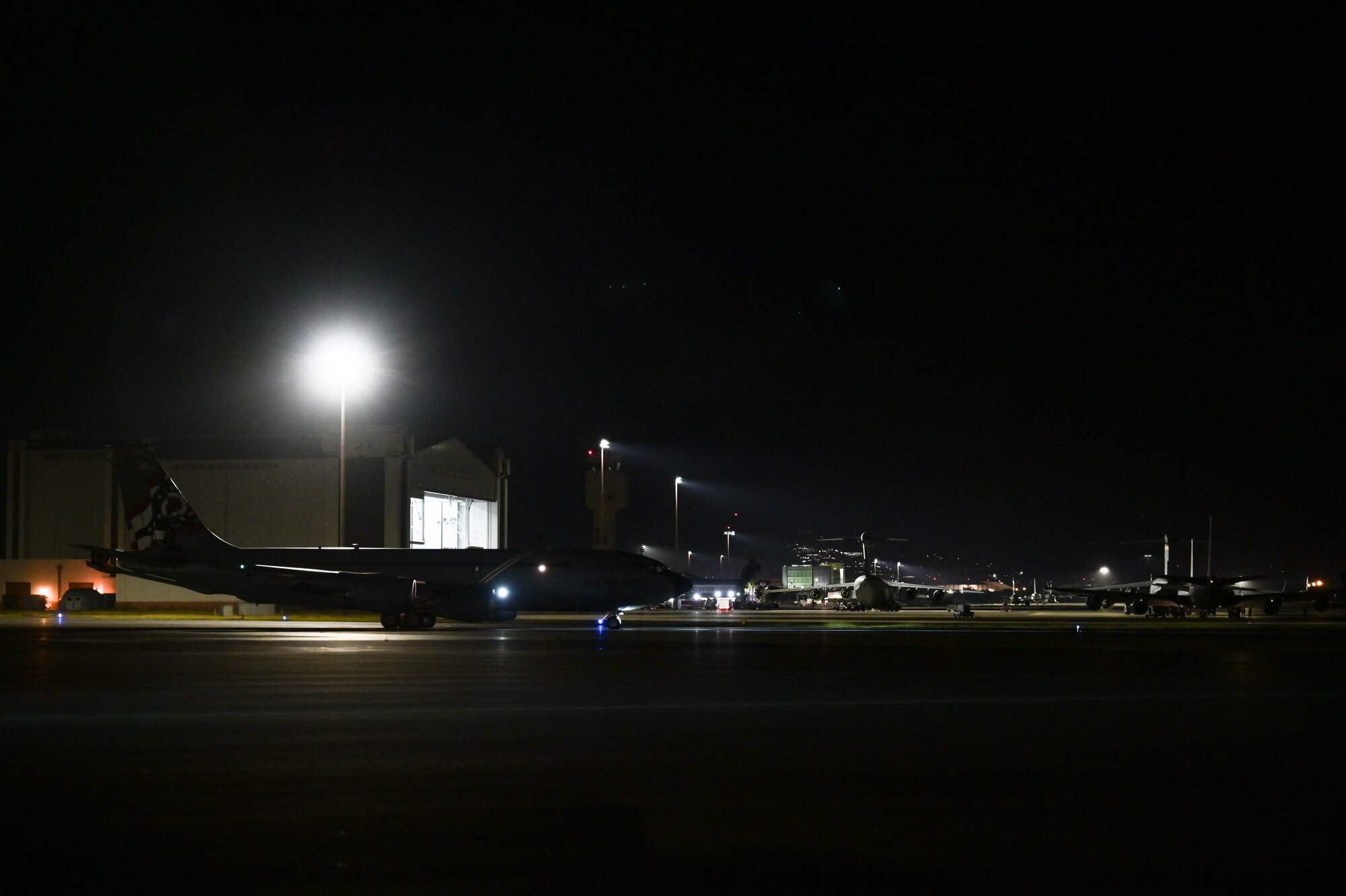 Aircraft taxiing on a flight line.