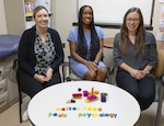 Walter Reed National Military Medical Center's Behavioral Health Consultants (from the left) Dr. Rebecca Cowan, Dr. Elizabeth Burleson and Dr. Leisa Small are team members in the Health Psychology Services Department, which integrates behavioral health services into routine pediatric care for the Military Health System. (DOD photo by Ann Brandstadter)