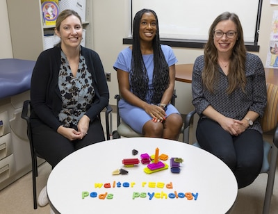 Walter Reed National Military Medical Center's Behavioral Health Consultants (from the left) Dr. Rebecca Cowan, Dr. Elizabeth Burleson and Dr. Leisa Small are team members in the Health Psychology Services Department, which integrates behavioral health services into routine pediatric care for the Military Health System. (DOD photo by Ann Brandstadter)