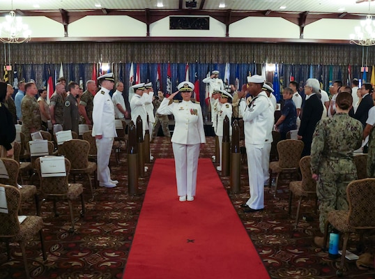 250601-N-DO281-2810 OKINAWA, Japan (Aug. 1, 2025) Capt. Cooperman turns over command of USNHO.  (U.S. Navy photo by Mass Communication Specialist 1st Class Trey Fowler)
