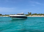 A motor yacht sits in the water in Puerto Rico.