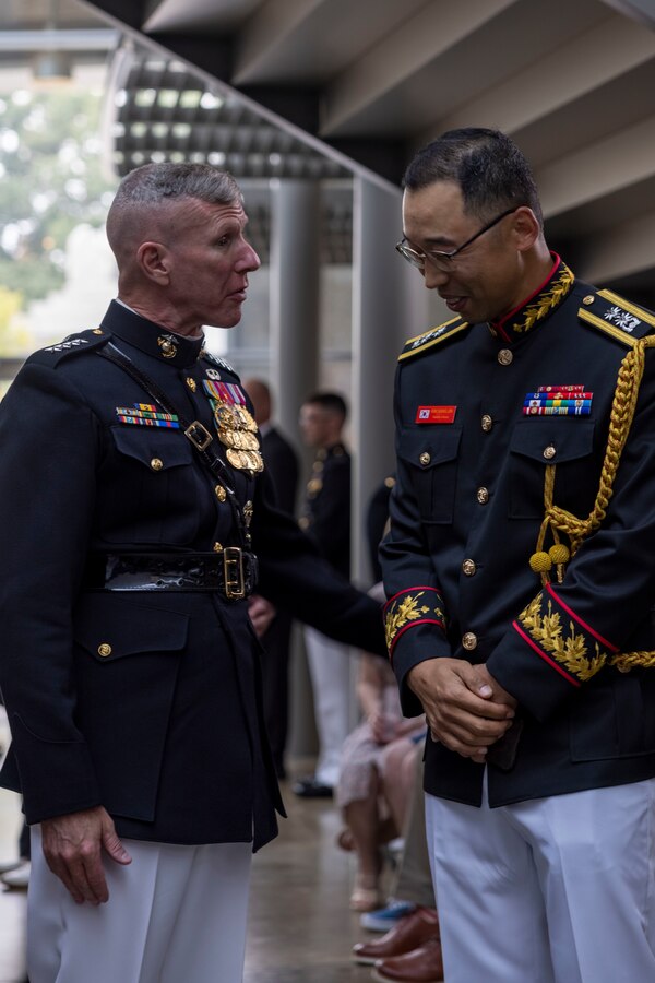 U.S. Marine Corps Gen. Eric Smith, the 39th Commandant of the Marine Corps, talks with Republic of Korea Lt. Gen. Il-Suk Ju during a reception prior to the Sunset Parade at the Marine Corps War Memorial, Aug. 5, 2025.The 2025 Marine Leaders of the Americas Conference, hosted by the Commandant of the Marine Corps and sponsored by U.S. Marine Corps Forces, South, convenes senior Marine and naval infantry leaders from Argentina, Australia, Belize, Brazil, Canada, Chile, Colombia, Dominican Republic, Ecuador, El Salvador, France, Guatemala, Honduras, Mexico, the Netherlands, New Zealand, Panama, Paraguay, Peru, Republic of Korea, United Kingdom and the United States to discuss shared security challenges and enhance regional cooperation. (U.S. Marine Corps photo by Lance Cpl. Payton Goodrich)