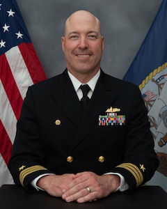Cmdr. Michael Schelcher