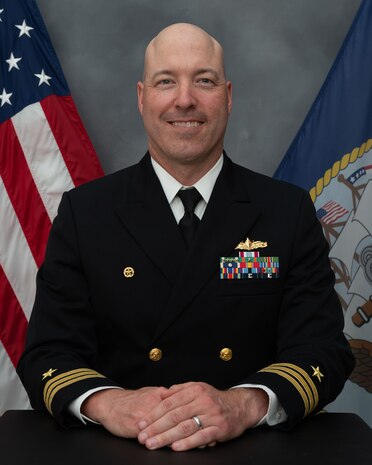 Cmdr. Michael Schelcher