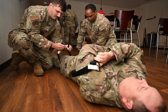Airmen with the 116th Maintenance Group, Georgia Air National Guard, participate in TCCC, or Tactical Combat Casualty Care, training while at Robins Air Force Base, Georgia, Aug. 5, 2025.