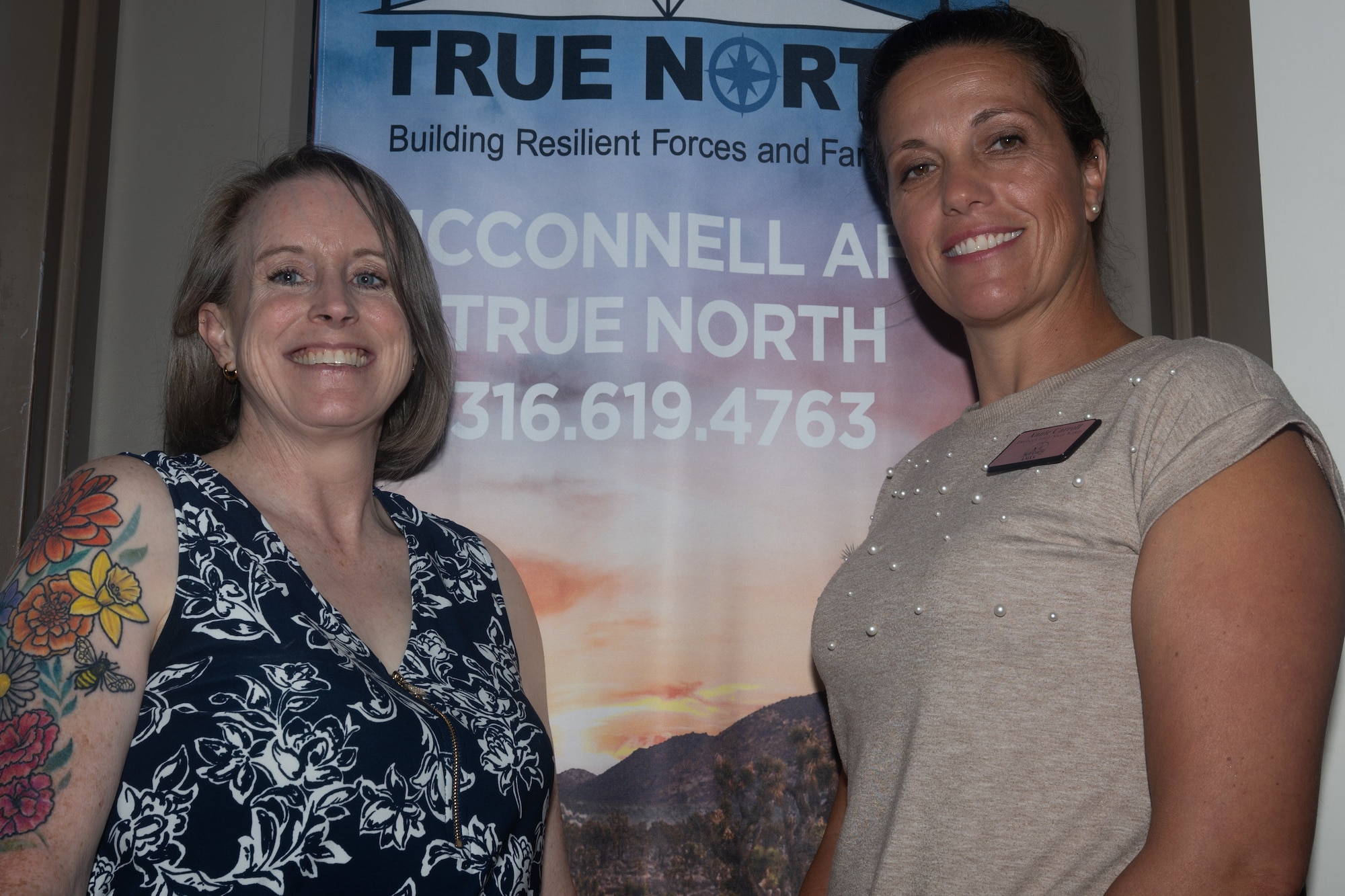 Amy Horne and Annie Carroll, social workers with the True North resiliency program, pose for a photo at McConnell Air Force Base, Kansas, July 31, 2025. Horne and Carroll were two providers who participated in the trial period of a sleep data collection app. (U.S. Air Force photo by Senior Airman Amelio Brown)