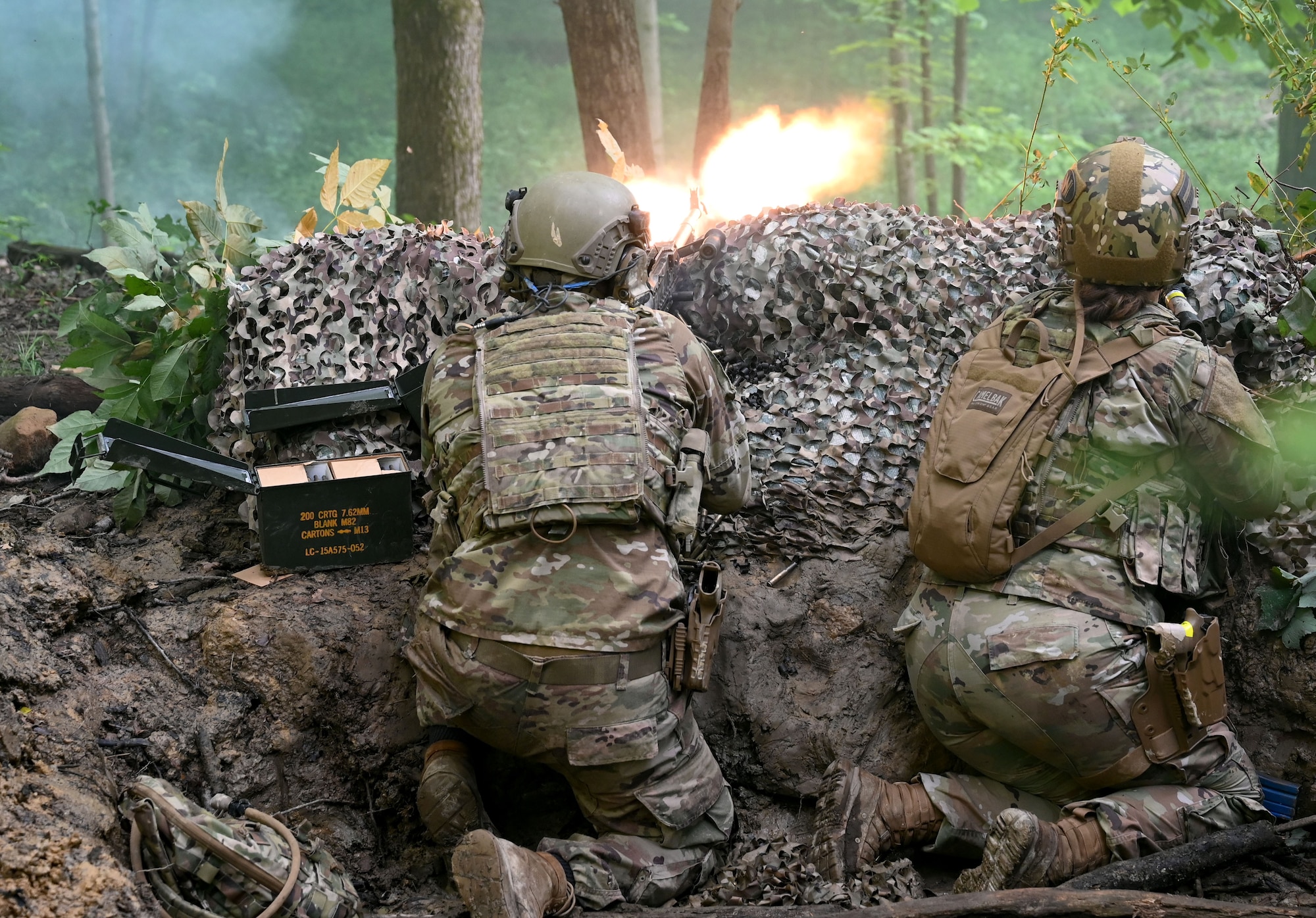 Defender fires weapon from defensive position