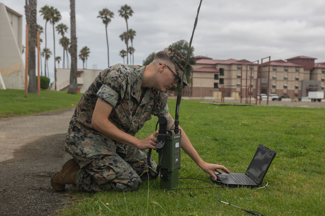 U.S. Marine Corps Cpl. Tyler Young, a transmissions systems operator with the 11th Marine Expeditionary Unit, I Marine Expeditionary Force, configures his radio as part of the U.S. Army’s High Frequency Skills Challenge on Marine Corps Base Camp Pendleton, California, July 23, 2025. The 11th MEU communications section participated in the HF Skills Challenge to hone and rehearse its long-range communication capabilities. (U.S. Marine Corps photo by Lance Cpl. Nicole Stuart)