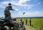Arkansas Guardsmen prepare their howitzers for sling loading and conduct an air assault exercise, June 9, 2025, Fort Chaffee, Arkansas.