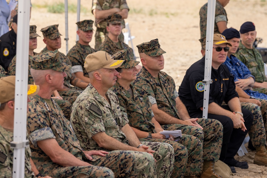 U.S. Marine Corps Lt. Gen. Bobbi Shea, commanding general, Fleet Marine Force, Atlantic, commander, Marine Forces Command, commander, Marine Forces Northern Command, with the 39th Commandant of the Marine Corps, Gen. Eric Smith and Acting Chief of Naval Operations Adm. Jim Kilby, observe an amphibious assault exercise as part of Atlantic Alliance 2025 in Fort Story, Virginia, June 30, 2025. II Marine Expeditionary Force, Marine Forces Reserve, and U.S. Second Fleet, along with NATO Allies from the Netherlands and the United Kingdom, are conducting Atlantic Alliance 2025. Atlantic Alliance 2025 is the premier East Coast amphibious exercise, taking place along the eastern seaboard from North Carolina to Maine and focusing on the unique amphibious capabilities offered by the Navy-Marine Corps team. (U.S. Marine Corps photo by Lance Cpl. Thirteen Bahizi)