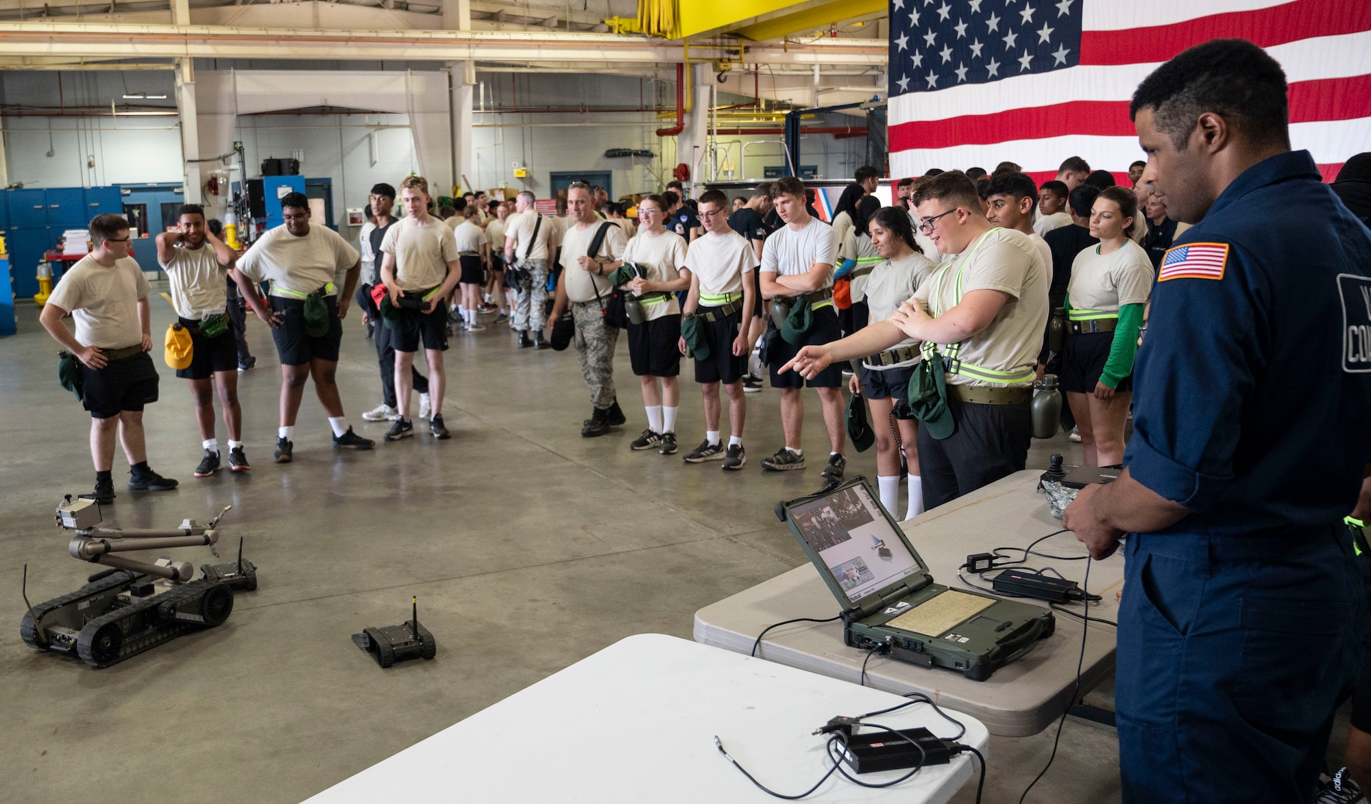 Civil Air Patrol cadets receive a robotics demonstration by the U.S. Coast Guard Atlantic Strike Team during the 2025 NJ Wing Basic Encampment at Joint Base-McGuire-Dix-Lakehurst, N.J., July 30, 2025.  The week-long encampment aimed to strengthen the cadets’ leadership skills, hone their fitness and character, and prepare them for future career opportunities in aerospace and technology. (U.S. Air Force photo by Susan Moriarty)