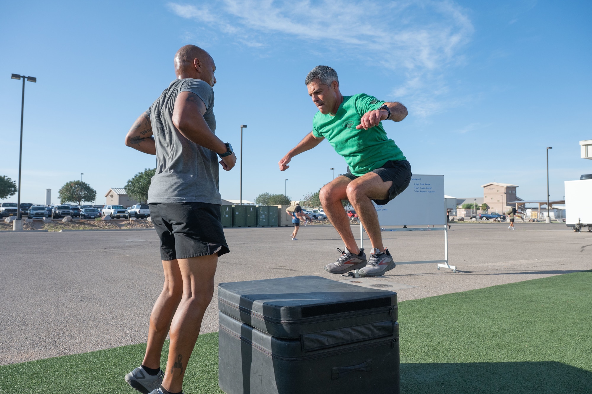 A U.S. Airman from the 48th Rescue Squadron performs a thruster at Davis-Monthan Air Force Base, August 6, 2025. Airmen performed thrusters, pull ups, box jumps and buddy carries for as many rounds as possible for 31 minutes, in memory of the 31 U.S. service members whose lives were lost during Extortion 17. (U.S. Air Force photo by Airman Jaden Kidd)