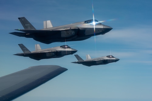 Royal Australian Air Force F-35A Lightning II aircraft fly alongside a U.S. Air Force KC-46 Pegasus aircraft from Travis Air Force Base, California, during Talisman Sabre 25 over the Northern Territory, Australia, July 17, 2025. Air Mobility Command’s five core mission areas are essential for the movement, maneuver, and sustainment of the Joint Force, Allies, and partners participating in this exercise. Talisman Sabre is the largest bilateral military exercise between Australia and the United States advancing a safe and secure Indo-Pacific by strengthening relationships and interoperability among key Allies and partners, while enhancing collective capabilities to respond to a wide array of potential security concerns. (U.S. Air Force photo by Senior Airman Clare Werner)