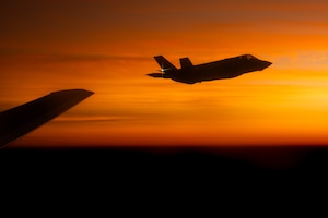 A Royal Australian Air Force F-35A Lightning II aircraft flies alongside a U.S. Air Force KC-46 Pegasus aircraft from Travis Air Force Base, California, during an aerial refueling mission as part of Talisman Sabre 25 over Northern Territory, Australia, July 17, 2025. ​​Talisman Sabre is the largest bilateral military exercise between Australia and the United States, that advances a safe and secure Indo-Pacific by strengthening relationships and interoperability among key Allies and partners, while enhancing collective capabilities to respond to a wide array of potential security concerns. (U.S. Air Force photo by Staff Sgt. Alex Lowe)