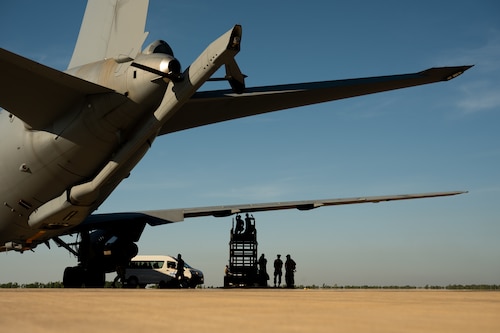 U.S. Airmen assigned to the 60th Maintenance Squadron, Travis Air Force Base, California, remove panels from a KC-46 Pegasus aircraft for inspection during Talisman Sabre 25 in Northern Territory, Australia, July 14, 2025. Talisman Sabre is the largest bilateral military exercise between Australia and the United States, that advances a safe and secure Indo-Pacific by strengthening relationships and interoperability among key Allies and partners, while enhancing collective capabilities to respond to a wide array of potential security concerns. (U.S. Air Force photo by Staff Sgt. Alex Lowe)