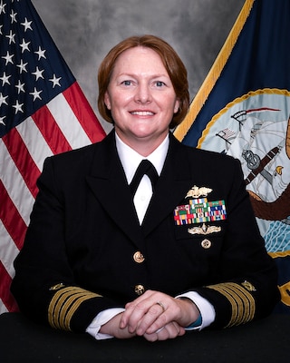 military officer poses for official photo