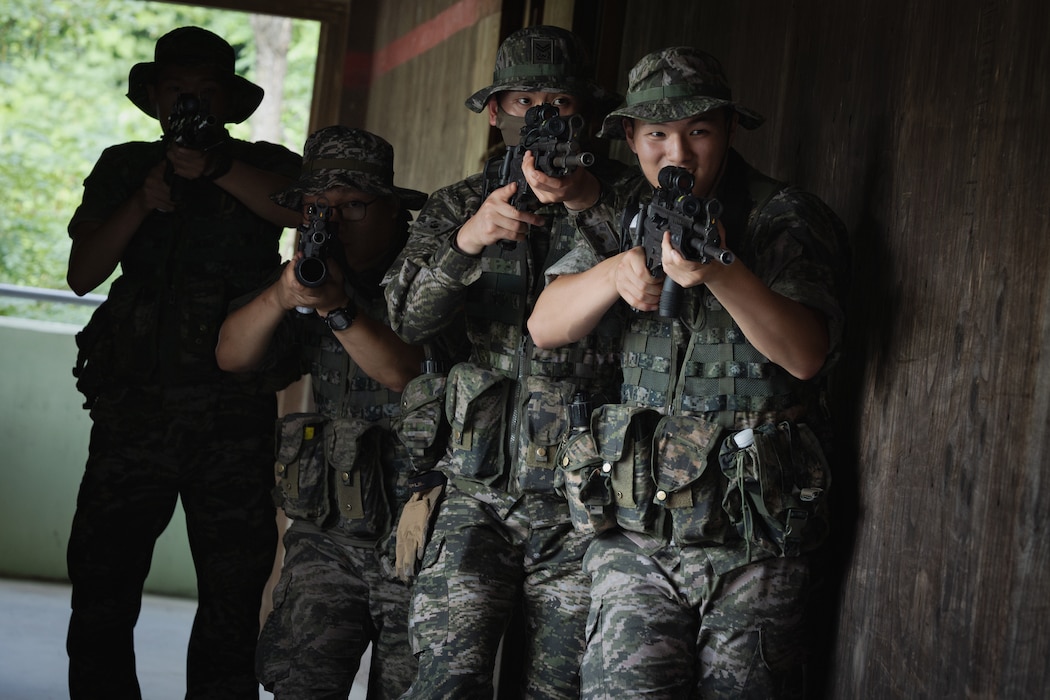 Republic of Korea Marines clear rooms during military operations in urban terrain training during the Korean Marine Exchange Program 25.2 in Pocheon, South Korea, July 22, 2025. KMEP is conducted regularly between the ROK and U.S. Marine Corps to increase their combined capabilities through realistic training geared towards deterring threats and maintaining peace in the Indo-Pacific. (U.S. Marine Corps photo by Lance Cpl. Van Hoang)