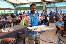 U.S. Army Soldiers from 2-23IN, 1SBCT, 4ID, work alongside Korean volunteers to distribute food to local seniors during a People to People International event in Pocheon, South Korea, Aug. 7, 2025. The program aimed to uplift community morale through service and cultural exchange.