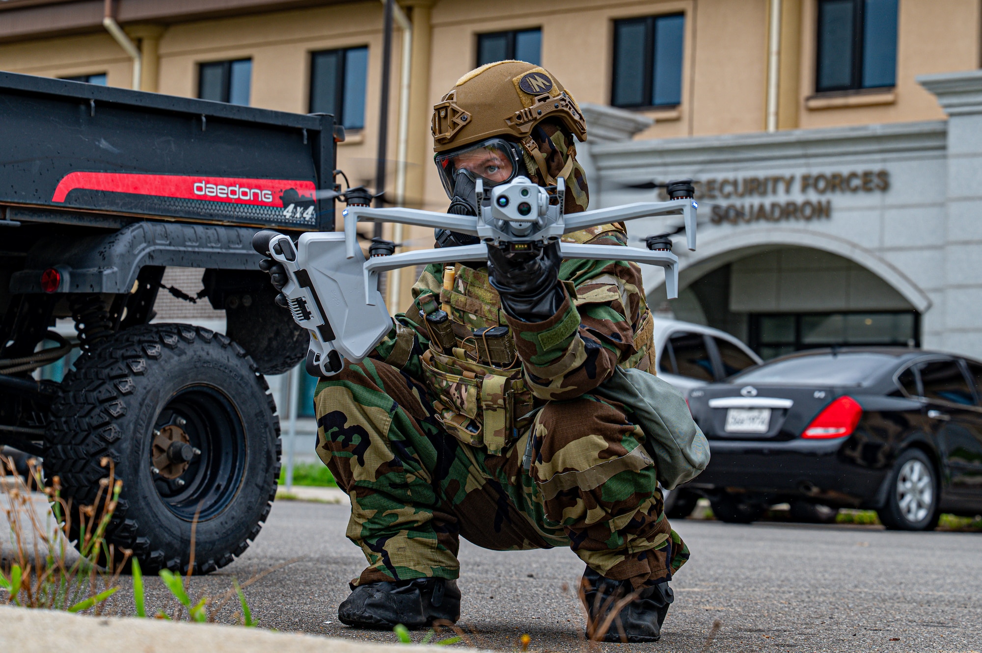 Senior Airman Cheyanne Parsons, 8th Security Forces Squadron counter small unmanned aerial system instructor, prepares to launch her drone to survey an area for enemy activity during exercise Beverly Sentinel 25-3