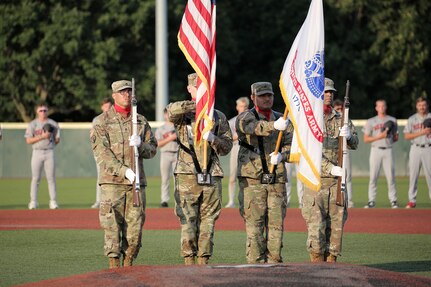 The 85th U.S. Army Reserve Support Command’s color guard team presents the nation’s colors during the playing of the national anthem at the American Legion, Post 76, Great Lakes Regional Baseball Tournament, August 6, 2025, in Carol Stream, Illinois.