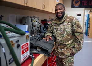 U.S. Air Force Senior Airman Tyreik Profit, 51st Operational Support Squadron aircrew flight equipment technician, poses for a picture at Osan Air Base, Republic of Korea, Aug. 5, 2025. Profit was a member of the most forward-deployed, permanently based OSS supporting operational flying unit and was awarded the Mustang of the Week for his dedication to work and outstanding professionalism. (U.S. Air Force photo by Staff Sgt. Sarah Williams)