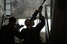 U.S. Marines with 2nd Battalion, 23rd Marines, forward deployed with 4th Marine Regiment, 3d Marine Division as part of the Unit Deployment Program, demonstrate how to clear a stairway during military operations in urban terrain training during the Korean Marine Exchange Program 25.2 in Pocheon, South Korea, July 22, 2025. KMEP is conducted regularly between the ROK and U.S. Marine Corps to increase their combined capabilities through realistic training geared towards deterring threats and maintaining peace in the Indo-Pacific. (U.S. Marine Corps photo by Lance Cpl. Van Hoang)