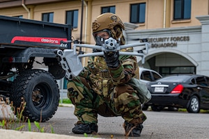 Senior Airman Cheyanne Parsons, 8th Security Forces Squadron counter small unmanned aerial system instructor, prepares to launch her drone to survey an area for enemy activity during exercise Beverly Sentinel 25-3