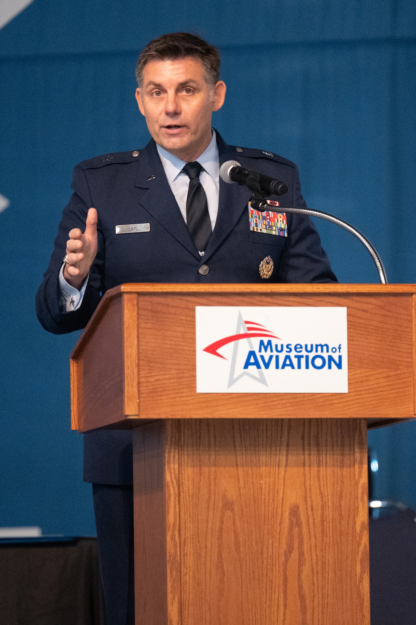 Man speaking at a podium