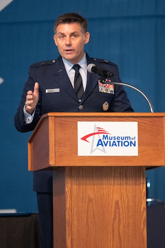Man speaking at a podium