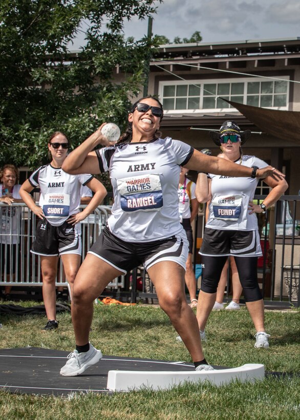 U.S. Army Staff Sgt. Mercedes Rangel prepares to launch the shot put during the field event at the 2025 Department of Defense Warrior Games in Colorado Springs, Colorado, July 22, 2025.