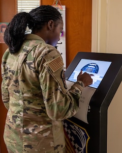 Staff Sgt. Kathrine Lender, 482nd Civil Engineer Squadron, signs in at the Military and Family Readiness Center at Homestead Air Reserve Base, Florida, Aug. 3, 2025. The M&FRC offers financial literacy tools such as workshops and one-on-one counseling to help service members and their families plan for a secure financial future.
(U.S. Air Force photo by Staff Sgt. Brianna Alvarez)