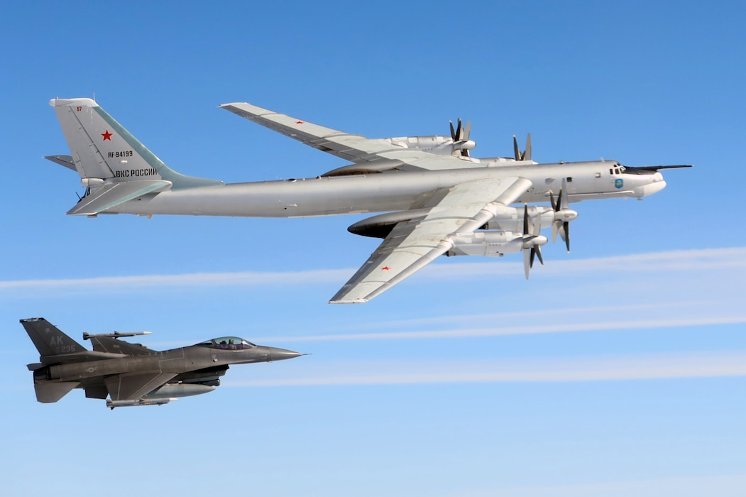 F-16 and Tu-95 flying