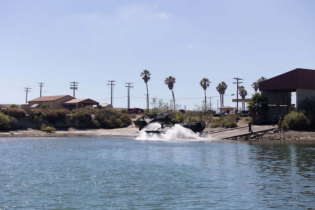 A U.S. Marine Corps amphibious combat vehicle with 3rd Assault Amphibian Battalion, 1st Marine Division, I Marine Expeditionary Force, enters the water during the Water Integration Training Program on Marine Corps Base Camp Pendleton, California, July 24, 2025. The Marines completed the WITP to develop and sustain essential amphibious skills to support the mission of the 11th Marine Expeditionary Unit, I MEF. (U.S. Marine Corps photo by Cpl. Oliver Nisbet)