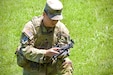 U.S. Army Sgt. Peter Kang, a drone operator with 1st Battalion, 109th Infantry Regiment, 2nd Infantry Brigade Combat Team, 28th Infantry Division, inspects an unmanned aerial system during a demonstration at Fort Indiantown Gap, Pennsylvania, July 28, 2025. The Soldiers and representatives from Carnegie Mellon University’s Software Engineering Institute demonstrated Project Shrike, an AI-enabled system for rapid target recognition and fire adjustment, by integrating drones and artillery during live-fire training. (U.S. Army National Guard photo by Maj. Travis Mueller)