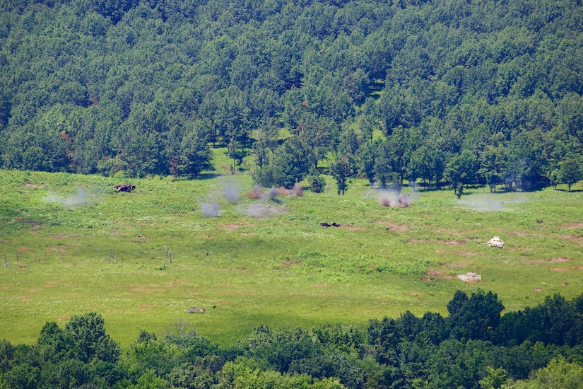 U.S. Soldiers with 1st Battalion, 109th Infantry Regiment, 2nd Infantry Brigade Combat Team, 28th Infantry Division operate an unmanned aerial system and call for artillery fire during a demonstration at Fort Indiantown Gap, Pennsylvania, July 28, 2025. The Soldiers and representatives from Carnegie Mellon University’s Software Engineering Institute demonstrated Project Shrike, an AI-enabled system for rapid target recognition and fire adjustment, by integrating drones and artillery during live-fire training. (U.S. Army National Guard photo by Maj. Travis Mueller)
