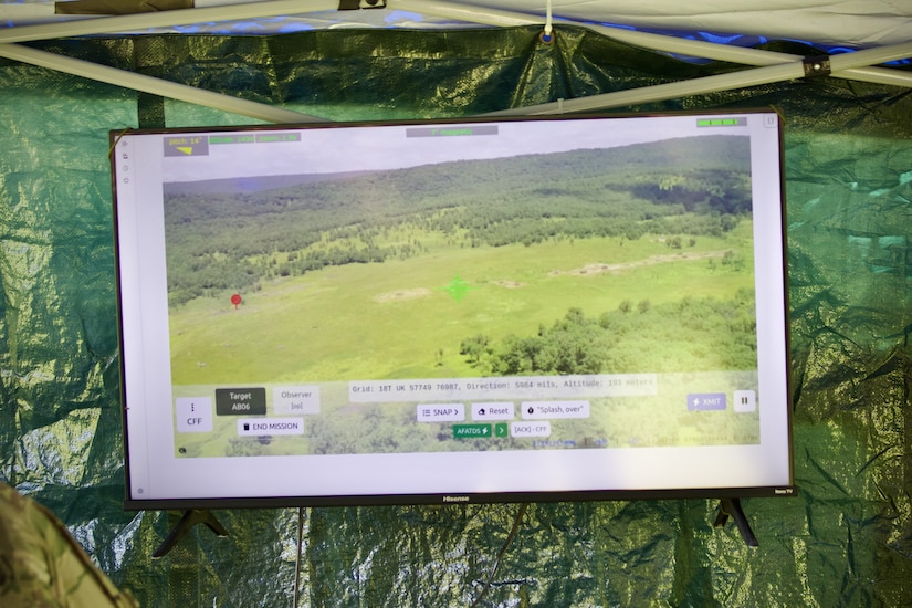 U.S. Soldiers with 1st Battalion, 109th Infantry Regiment, 2nd Infantry Brigade Combat Team, 28th Infantry Division operate an unmanned aerial system and call for artillery fire during a demonstration at Fort Indiantown Gap, Pennsylvania, July 28, 2025. The Soldiers and representatives from Carnegie Mellon University’s Software Engineering Institute demonstrated Project Shrike, an AI-enabled system for rapid target recognition and fire adjustment, by integrating drones and artillery during live-fire training. (U.S. Army National Guard photo by Maj. Travis Mueller)