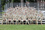 U.S. Army officer candidates pose for a photo before graduating from Officer Candidate School (OCS) Phase III at Joint Base Lewis-McChord, Wash., Aug. 7, 2025. OCS Phase III is a culminating event hosted by 2nd Battalion, 205th Regiment, Regional Training Institute, Washington National Guard, that tests officer candidates on their leadership and critical thinking abilities before commissioning as second lieutenants.