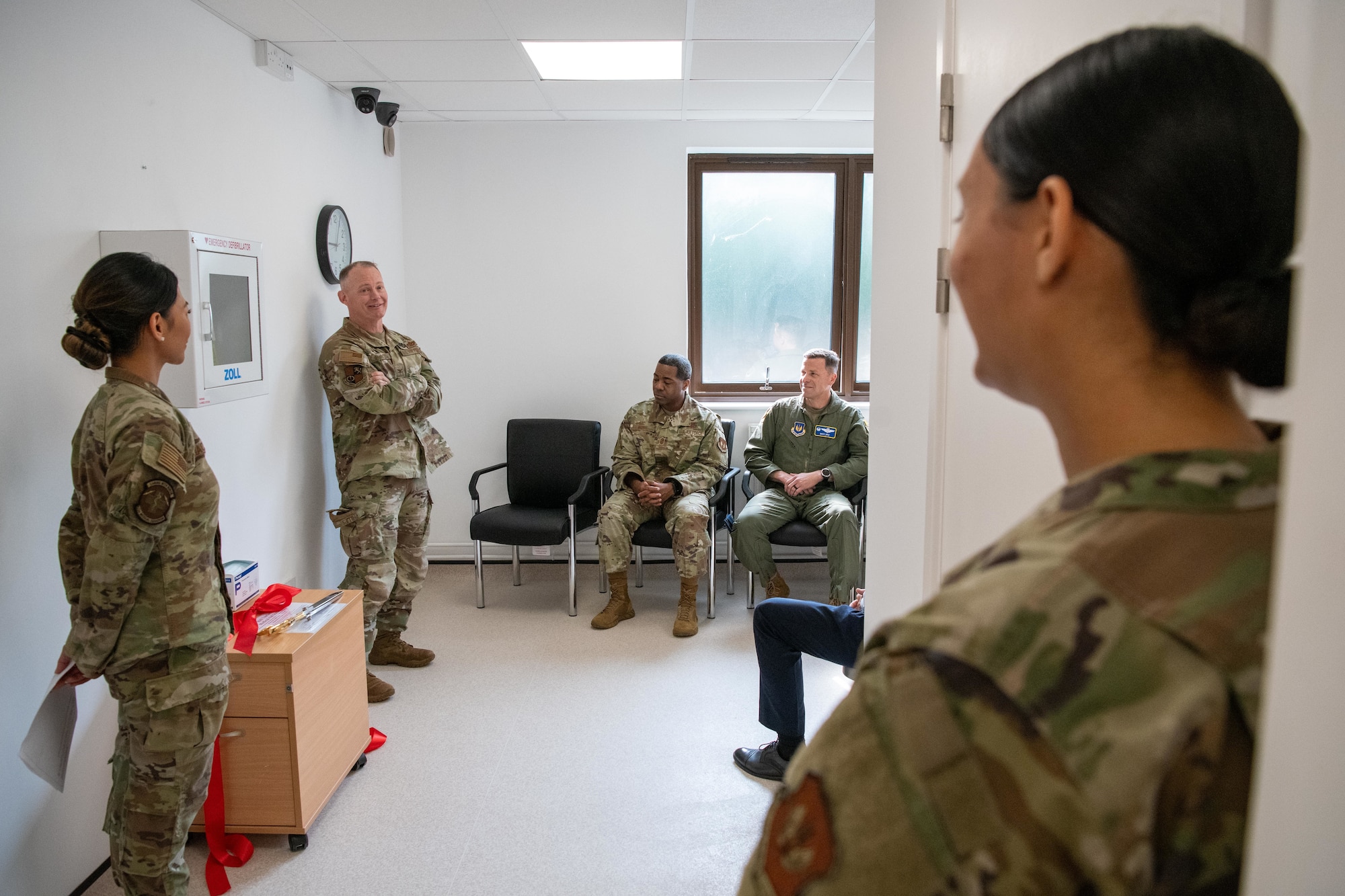 Col. D. Landon Phillips, then-501st Combat Support Wing commander, addresses attendees during the ribbon-cutting ceremony