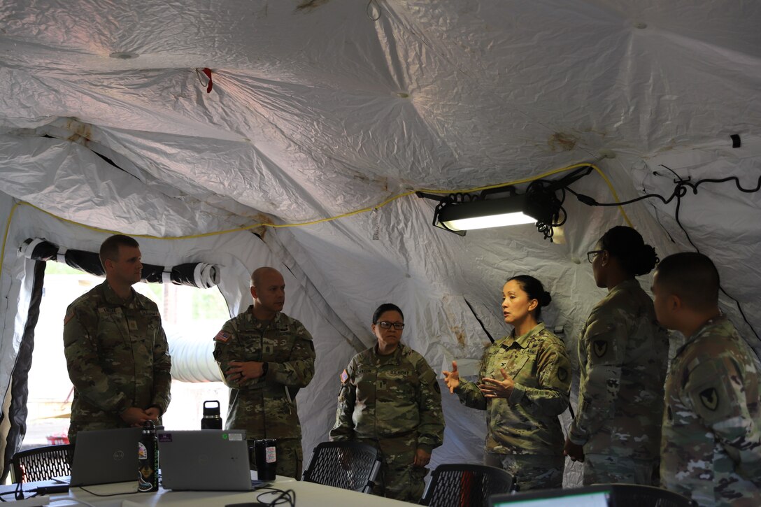 Col. Courtney Sugai provides operational guidance to the brigade staff inside the 402nd Army Field Support Brigade Tactical Operations Center during Exercise Talisman Sabre 25.