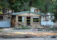 The remains of a house during a flash flood in Ruidoso, NM, on August 4, 2025. New Mexico National Guard units provided aid to the city of Ruidoso after Monsoon rain flooded the city.
