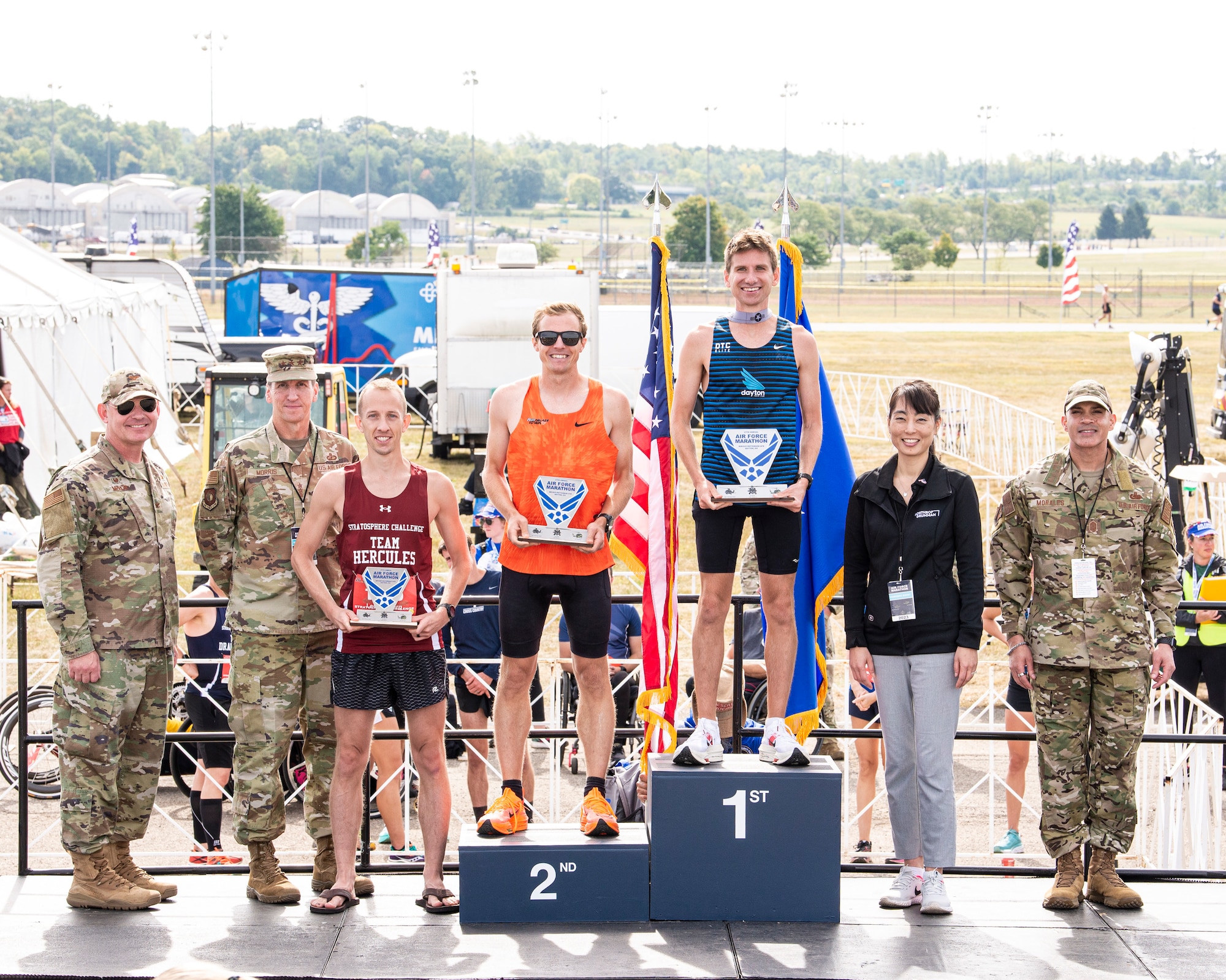 Maj. Brett Lechtenberg, 377th Comptroller Squadron director of operations, stands on the podium after placing third in the men’s division during the 27th Annual Air Force Marathon at Wright-Patterson Air Force Base, Ohio, Sept. 16, 2023. Lechtenberg also placed second among all military competitors in the full marathon event. (Courtesy Photo)