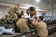 U.S. Air Force Airmen from the 5th Munitions Squadron (5MUNS) build a MK-82 conical munition at Minot Air Force Base, North Dakota, August 4, 2025. 5MUNS built the MK-82 conical in preparation for the Air Force Combat Operations Competition, where they will compete against other munitions squadrons in munition building exercises.