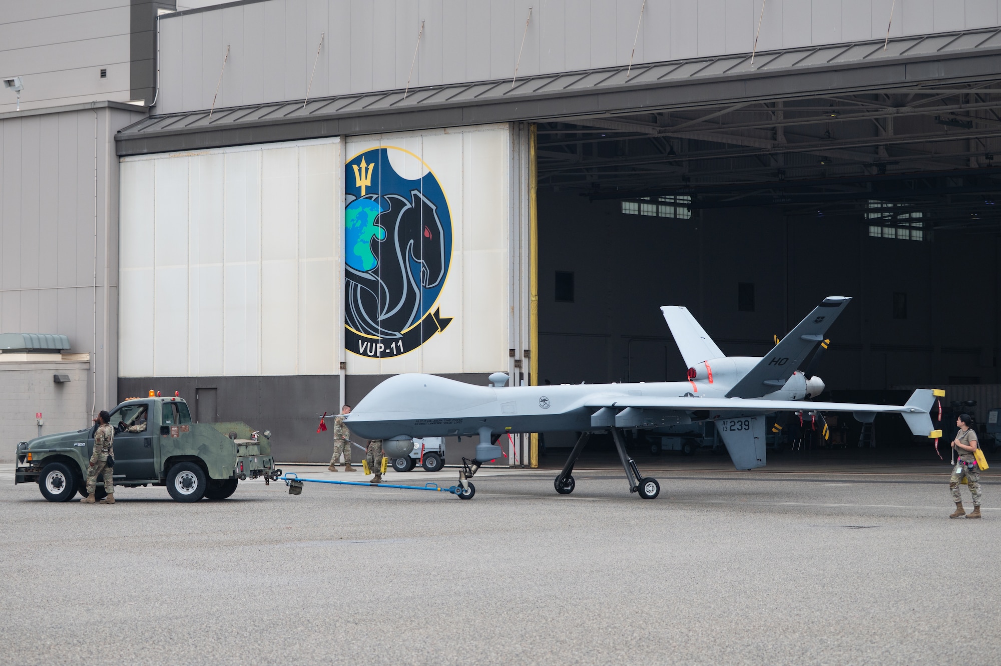 A U.S. Air Force MQ-9 Reaper assigned to the 9th Attack Squadron is wheeled out of a hangar during Exercise Zia Sunbird at Naval Base Ventura County Point Mugu, Calif., July 21, 2025.