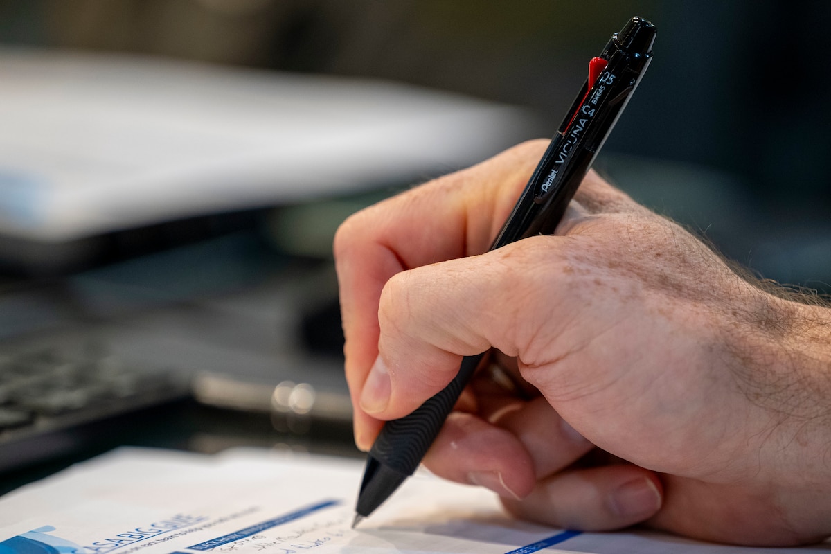 U.S. Air Force Col. John Ethridge, 49th Wing commander, takes notes during the judging of the 2025 Big Give projects at Holloman Air Force Base, New Mexico, July 31, 2025.